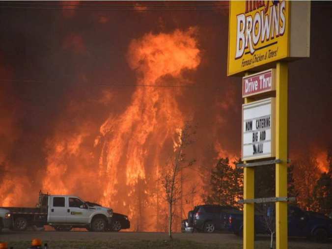 a-wall-of-fire-rages-outside-of-fort-mcmurray-alta-tuesday