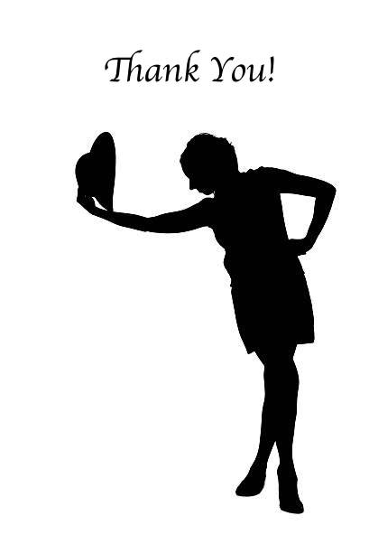 Photo of a woman silhouette taking off a hat. Taken in Riga, Latvia.